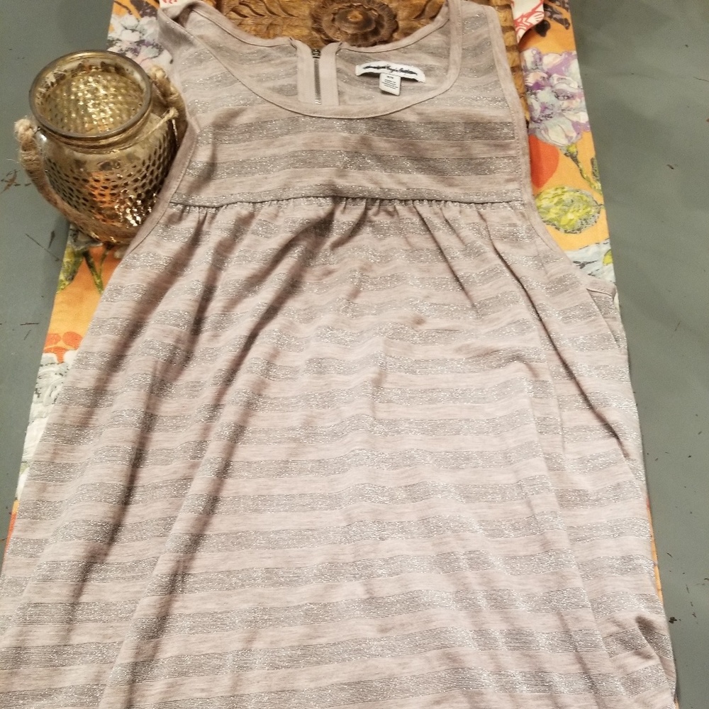 Size medium tank. Tan and silver with zipper back